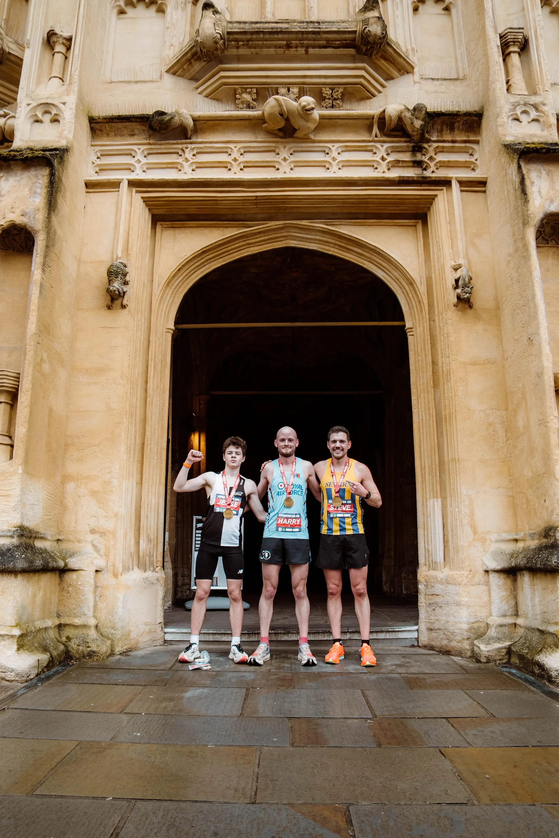 Runners posing outside the church after the race