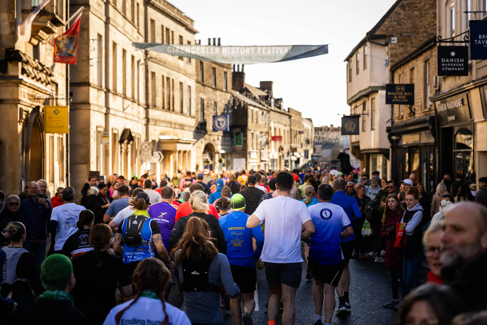 Runners filling the historic streets at the Cirencester Half Marathon
